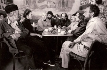 cafe triestebeat poets around table